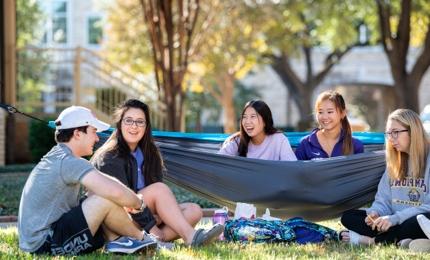 Students enjoying a nice day outside on campus